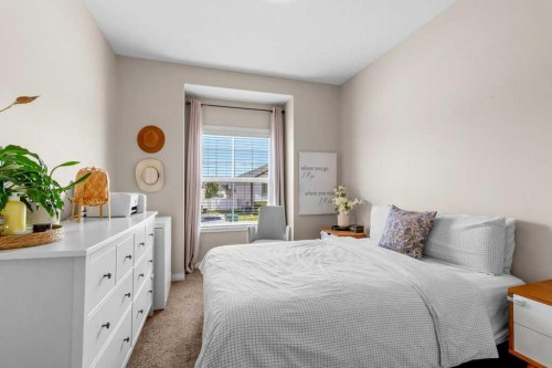 125 Henderson Crescent, Penhold, AB - Indoor Photo Showing Bedroom