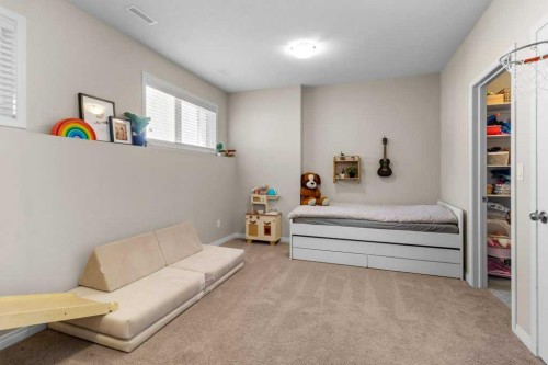 125 Henderson Crescent, Penhold, AB - Indoor Photo Showing Bedroom