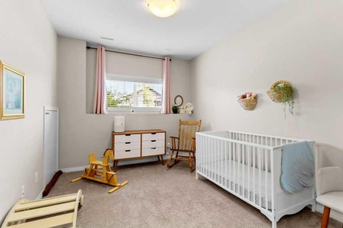 125 Henderson Crescent, Penhold, AB - Indoor Photo Showing Bedroom