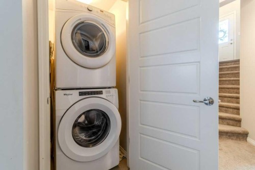 125 Henderson Crescent, Penhold, AB - Indoor Photo Showing Laundry Room