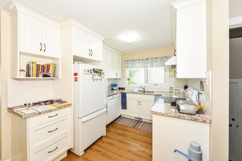 4310A 65 Street, Camrose, AB - Indoor Photo Showing Kitchen With Double Sink