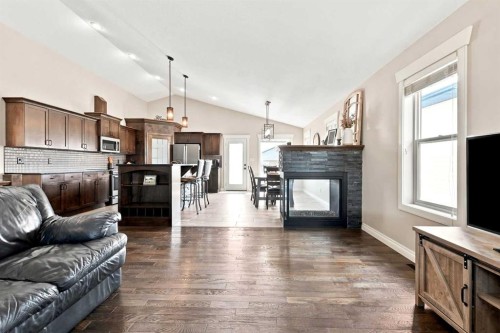73 Maclean Close, Blackfalds, AB - Indoor Photo Showing Living Room With Fireplace