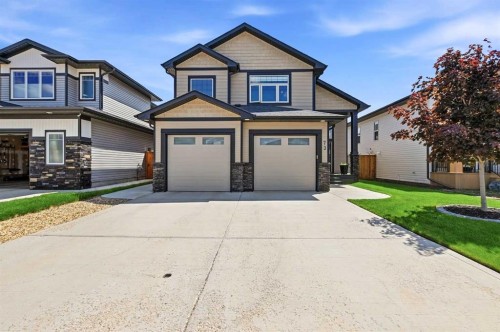 73 Maclean Close, Blackfalds, AB - Outdoor With Facade