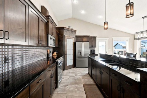73 Maclean Close, Blackfalds, AB - Indoor Photo Showing Kitchen With Upgraded Kitchen