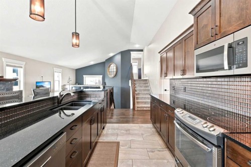73 Maclean Close, Blackfalds, AB - Indoor Photo Showing Kitchen With Double Sink