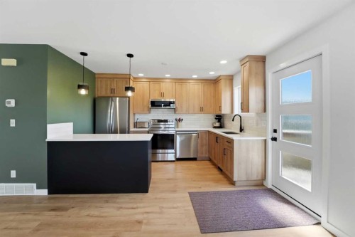 4901A Womacks Road, Blackfalds, AB - Indoor Photo Showing Kitchen With Stainless Steel Kitchen