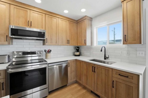 4901A Womacks Road, Blackfalds, AB - Indoor Photo Showing Kitchen With Stainless Steel Kitchen