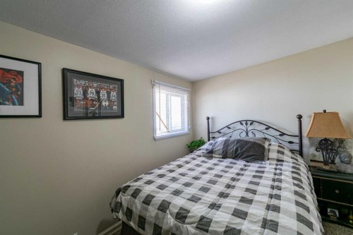 4 48A Street Close, Alix, AB - Indoor Photo Showing Bedroom