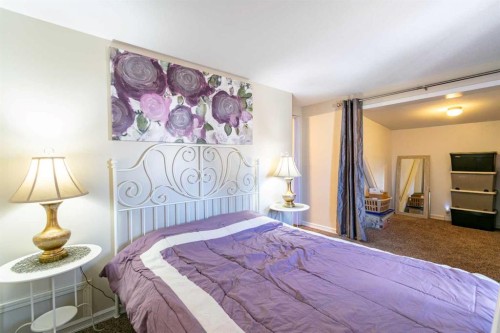 4 48A Street Close, Alix, AB - Indoor Photo Showing Bedroom