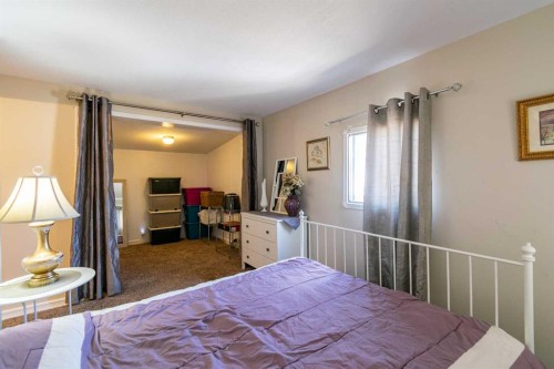 4 48A Street Close, Alix, AB - Indoor Photo Showing Bedroom
