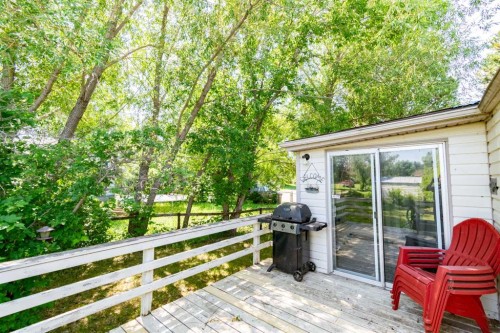 4 48A Street Close, Alix, AB - Outdoor With Deck Patio Veranda