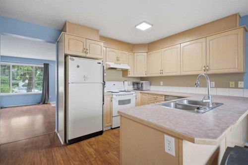 4808 Landsdown Avenue, Blackfalds, AB - Indoor Photo Showing Kitchen With Double Sink