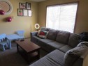 595-100 Jordan Parkway, Red Deer, AB  - Indoor Photo Showing Living Room 
