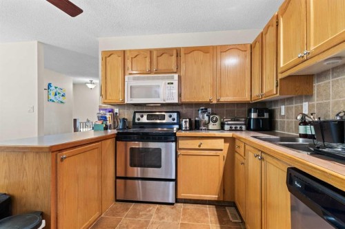 5 Mccullough Crescent, Red Deer, AB - Indoor Photo Showing Kitchen With Double Sink