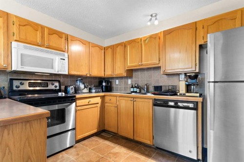 5 Mccullough Crescent, Red Deer, AB - Indoor Photo Showing Kitchen