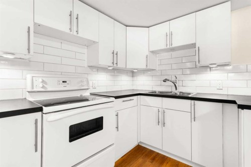 5 Mccullough Crescent, Red Deer, AB - Indoor Photo Showing Kitchen With Double Sink