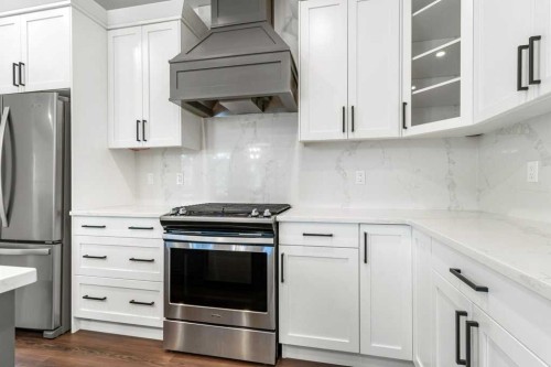 3902 46 Street, Red Deer, AB - Indoor Photo Showing Kitchen With Upgraded Kitchen