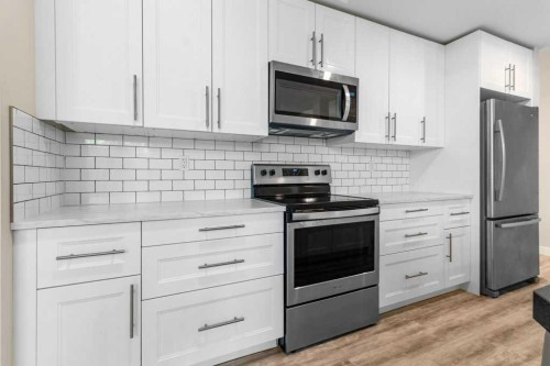 3902 46 Street, Red Deer, AB - Indoor Photo Showing Kitchen With Upgraded Kitchen