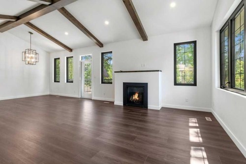 3902 46 Street, Red Deer, AB - Indoor Photo Showing Living Room With Fireplace