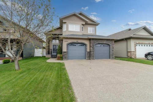 6002 Orr Drive, Red Deer, AB - Outdoor With Facade