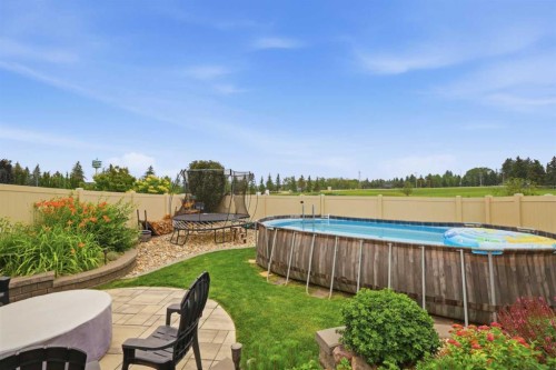 1 Meadow Close, Lacombe, AB - Outdoor With Above Ground Pool With Backyard