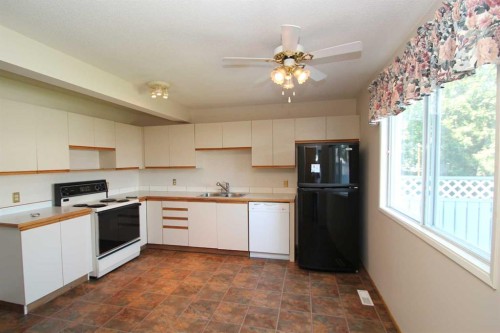 9 Greig Close, Red Deer, AB - Indoor Photo Showing Kitchen With Double Sink