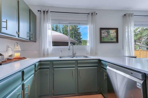 4 Anders Street, Red Deer, AB - Indoor Photo Showing Kitchen With Double Sink