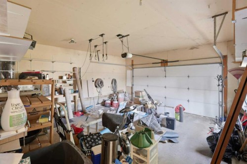 31 Palmer Close, Sylvan Lake, AB - Indoor Photo Showing Garage