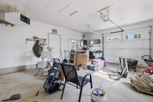 31 Palmer Close, Sylvan Lake, AB - Indoor Photo Showing Garage