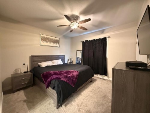 58 Village Crescent, Red Deer, AB - Indoor Photo Showing Bedroom