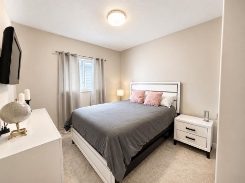 58 Village Crescent, Red Deer, AB - Indoor Photo Showing Bedroom