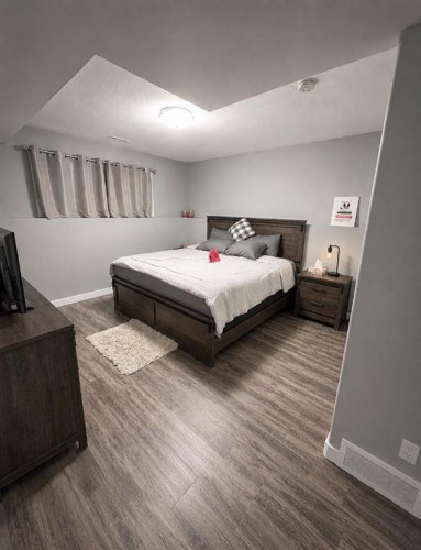 58 Village Crescent, Red Deer, AB - Indoor Photo Showing Bedroom