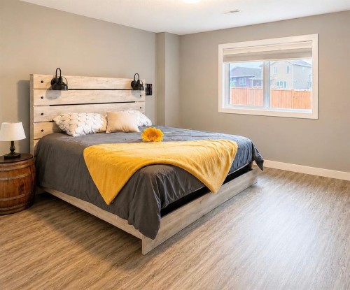 58 Village Crescent, Red Deer, AB - Indoor Photo Showing Bedroom