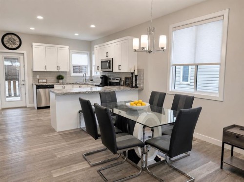 58 Village Crescent, Red Deer, AB - Indoor Photo Showing Dining Room