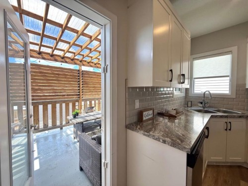 58 Village Crescent, Red Deer, AB - Indoor Photo Showing Kitchen With Double Sink