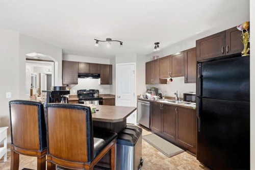 415-31 Jamieson Avenue, Red Deer, AB - Indoor Photo Showing Kitchen With Double Sink