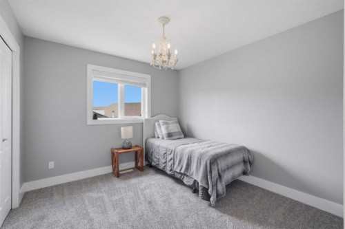 13 Hendrickson Bay, Sylvan Lake, AB - Indoor Photo Showing Bedroom