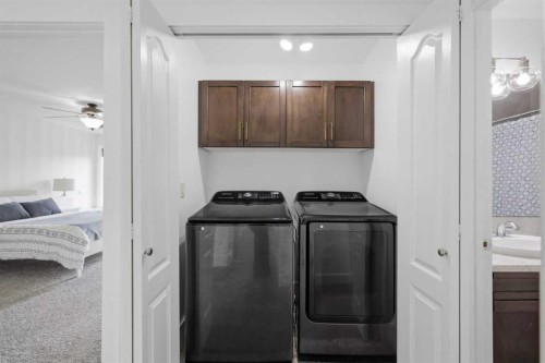 13 Hendrickson Bay, Sylvan Lake, AB - Indoor Photo Showing Laundry Room