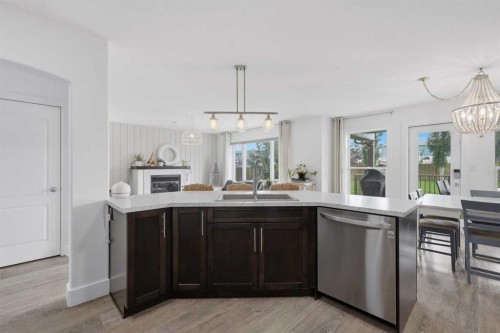 13 Hendrickson Bay, Sylvan Lake, AB - Indoor Photo Showing Kitchen With Double Sink