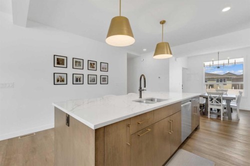 A-10 Evergreen Way, Red Deer, AB - Indoor Photo Showing Kitchen With Double Sink