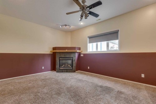82 Ruttan Close, Red Deer, AB - Indoor With Fireplace