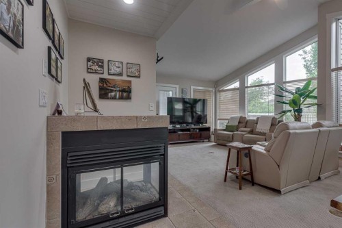 111 Selkirk Boulevard, Red Deer, AB - Indoor Photo Showing Living Room With Fireplace