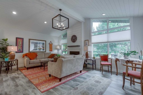 111 Selkirk Boulevard, Red Deer, AB - Indoor Photo Showing Living Room With Fireplace