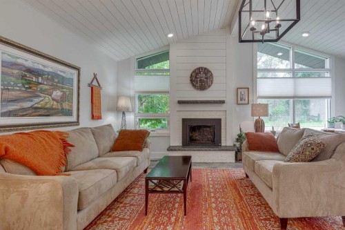 111 Selkirk Boulevard, Red Deer, AB - Indoor Photo Showing Living Room With Fireplace