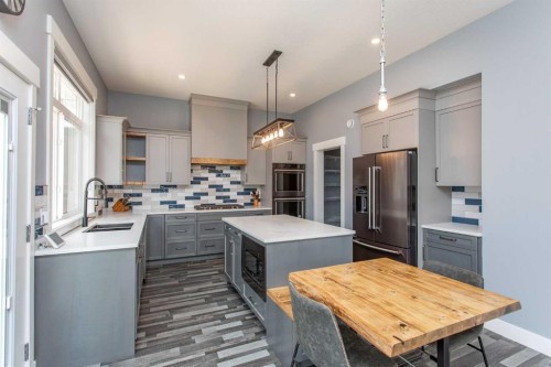 10 Tagish Avenue, Red Deer, AB - Indoor Photo Showing Kitchen With Double Sink With Upgraded Kitchen