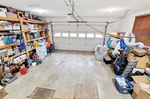74 Oaklands Crescent, Red Deer, AB - Indoor Photo Showing Garage