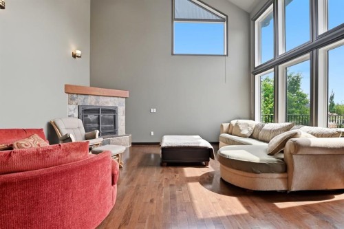 74 Oaklands Crescent, Red Deer, AB - Indoor Photo Showing Living Room With Fireplace