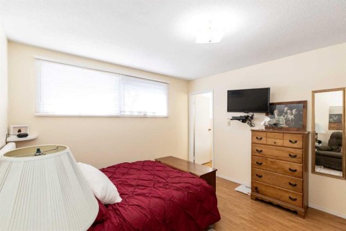 4003 53 Avenue, Innisfail, AB - Indoor Photo Showing Bedroom