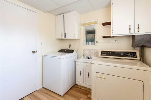 4003 53 Avenue, Innisfail, AB - Indoor Photo Showing Laundry Room