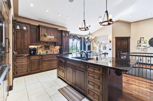 6297 Cronquist Drive, Red Deer, AB - Indoor Photo Showing Kitchen With Double Sink With Upgraded Kitchen